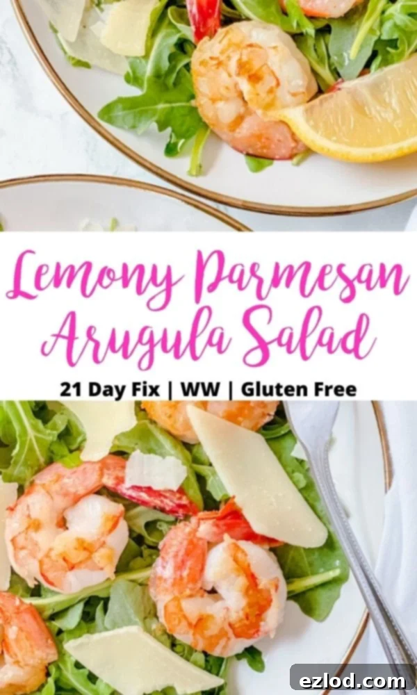 Close up photo of salads on a white plate with a black and pink text overlay- Lemony Parmesan Arugula Salad | 21 Day Fix | WW | Gluten Free