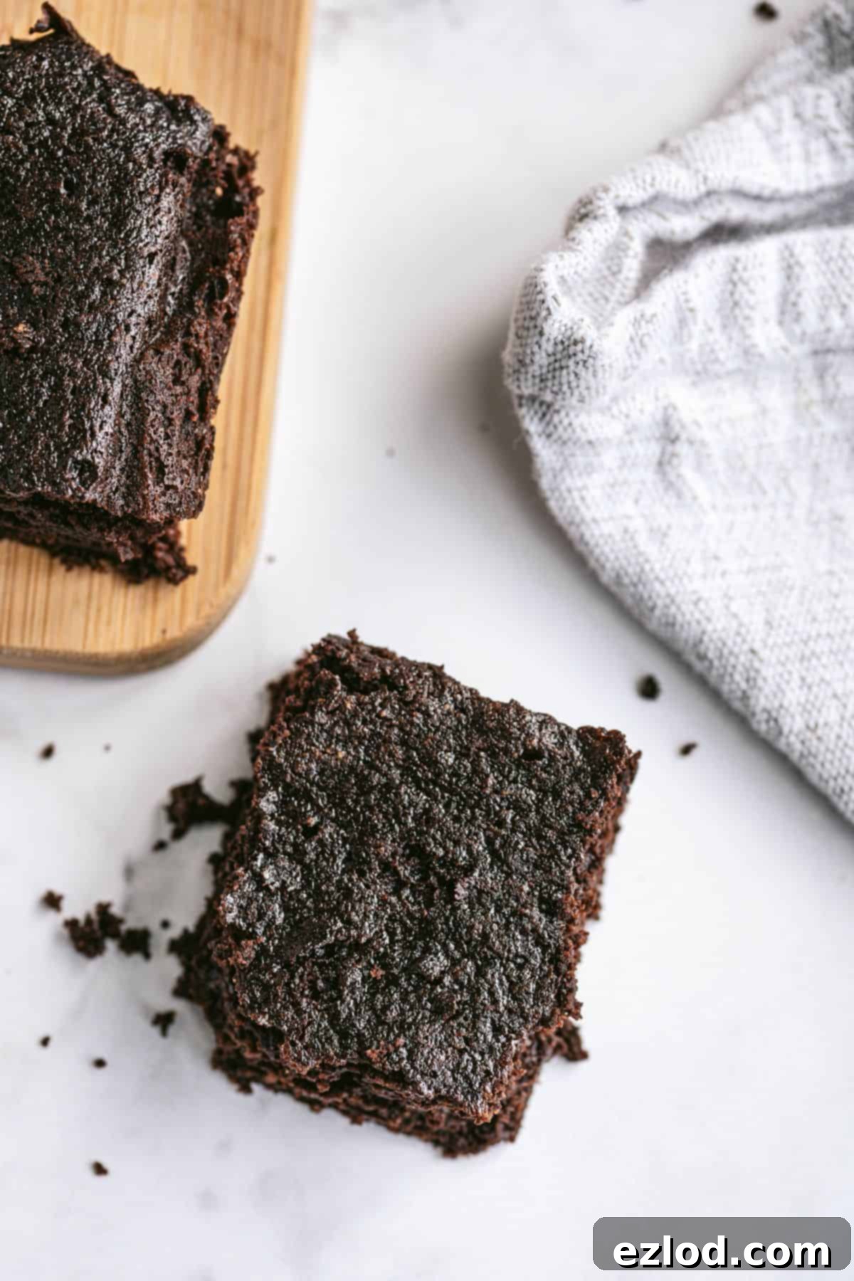 Overhead shot of homemade healthy brownies, freshly baked and cooling.