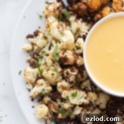 Air Fryer Cauliflower with three seasoning options and cheese sauce