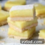 A stack of vegan lemon bars.