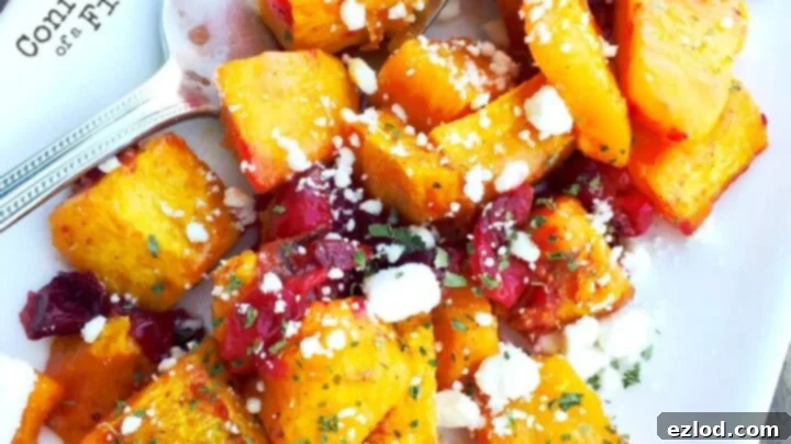 Warm Honey Roasted Butternut Squash Salad with cranberries and goat cheese.