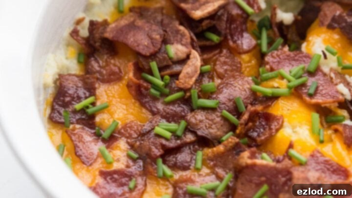 Creamy Instant Pot Loaded Cauliflower Mash, a healthier alternative to mashed potatoes.