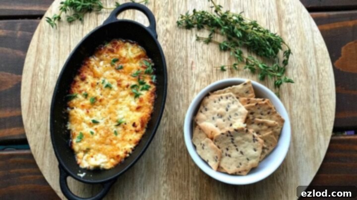 Creamy and sweet Honey Roasted Feta Dip, perfect with crackers or veggies.