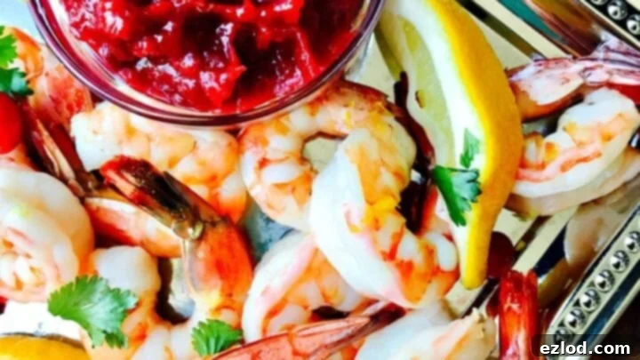 Roasted Shrimp Cocktail with a vibrant cranberry horseradish chutney.