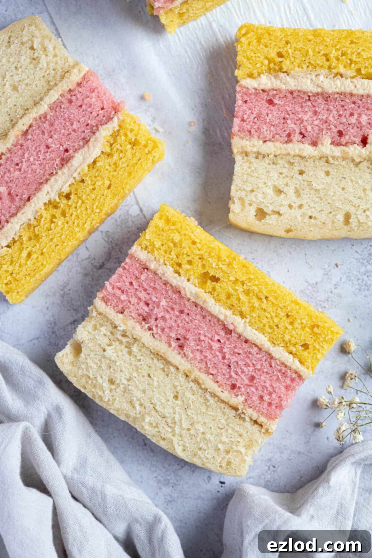 Three slices of vegan angel cake.