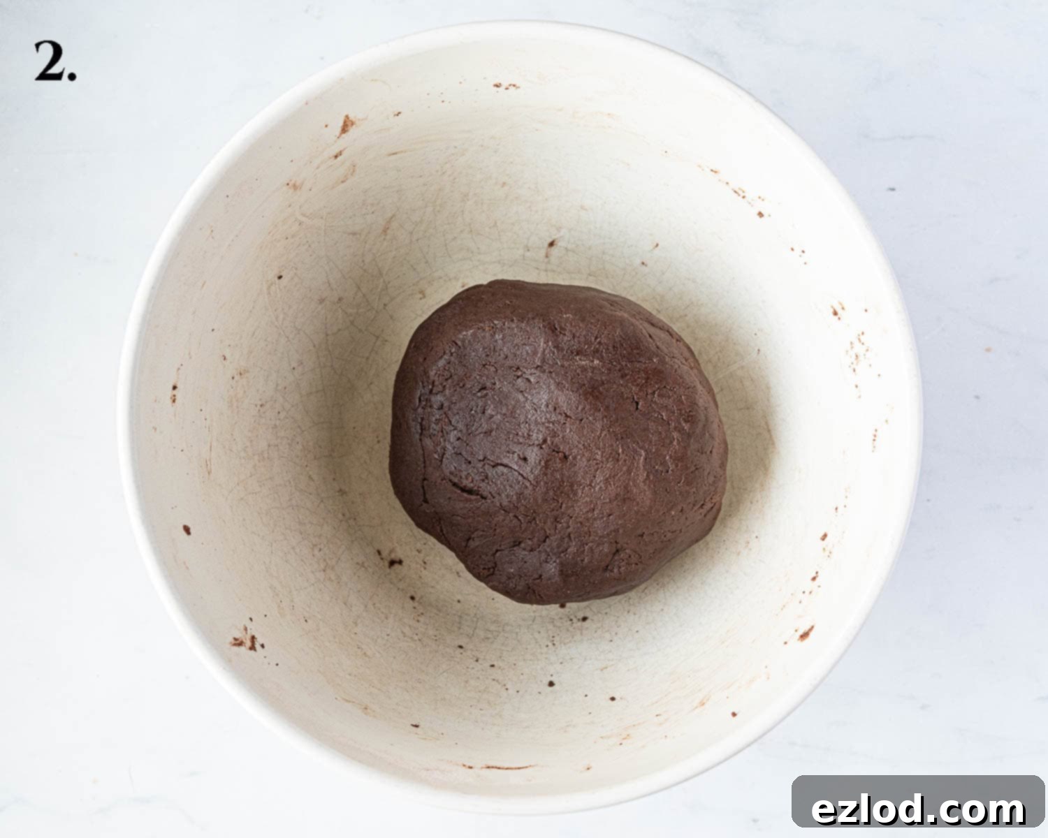 Step 2 in making chocolate strawberry tart: The prepared pastry dough, shaped into a smooth disc and ready for chilling.