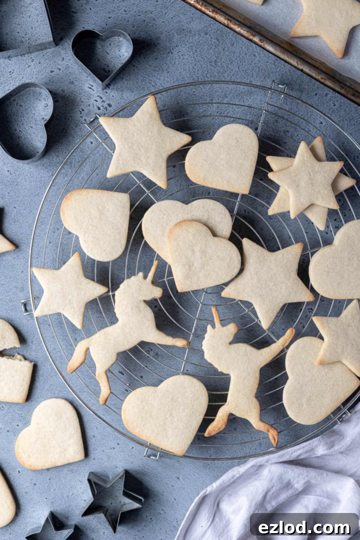 Vegan vanilla sugar cookies on a wire cooling rack.