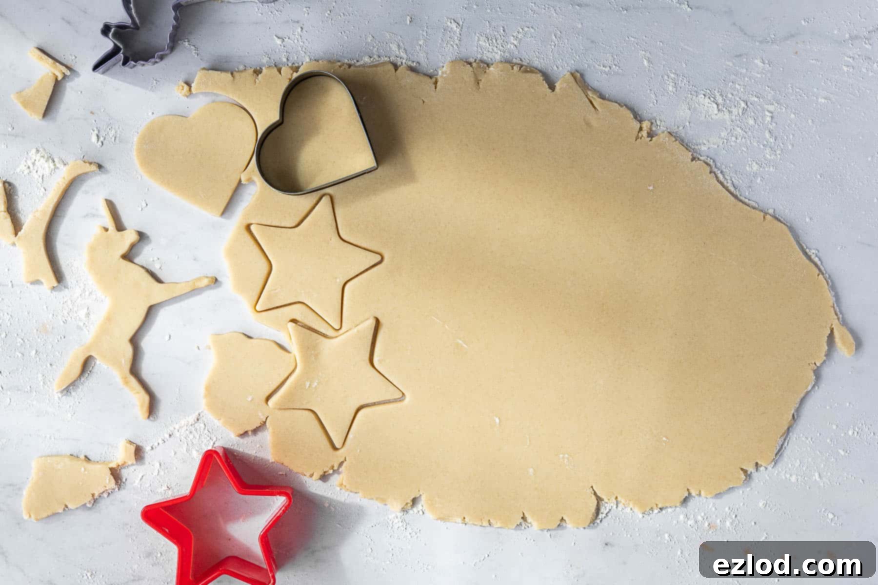 Step 5, rolling out the dough and cutting out the cookies.