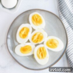 A plate is presented with 6 pieces of halved hard boiled eggs.