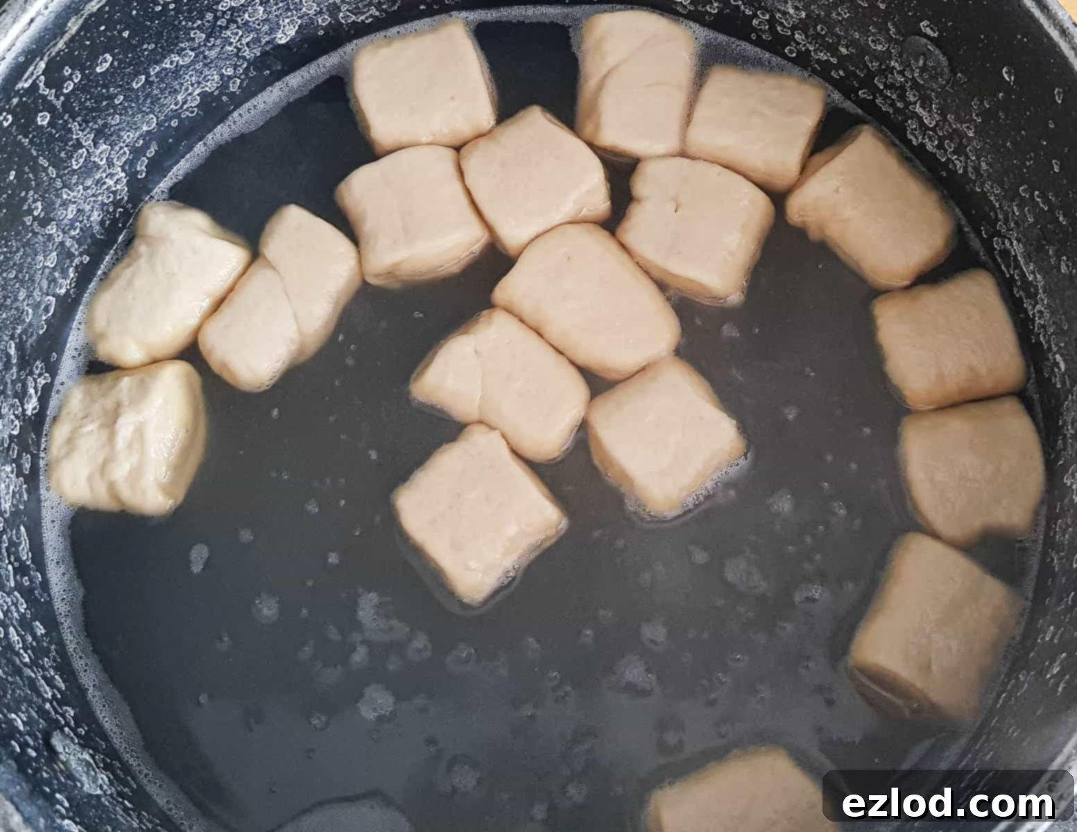 Step 7, poaching the bites in the baking soda bath.
