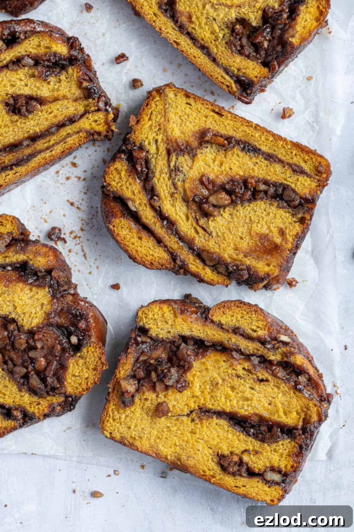 Close up of slices of pumpkin pecan babka.
