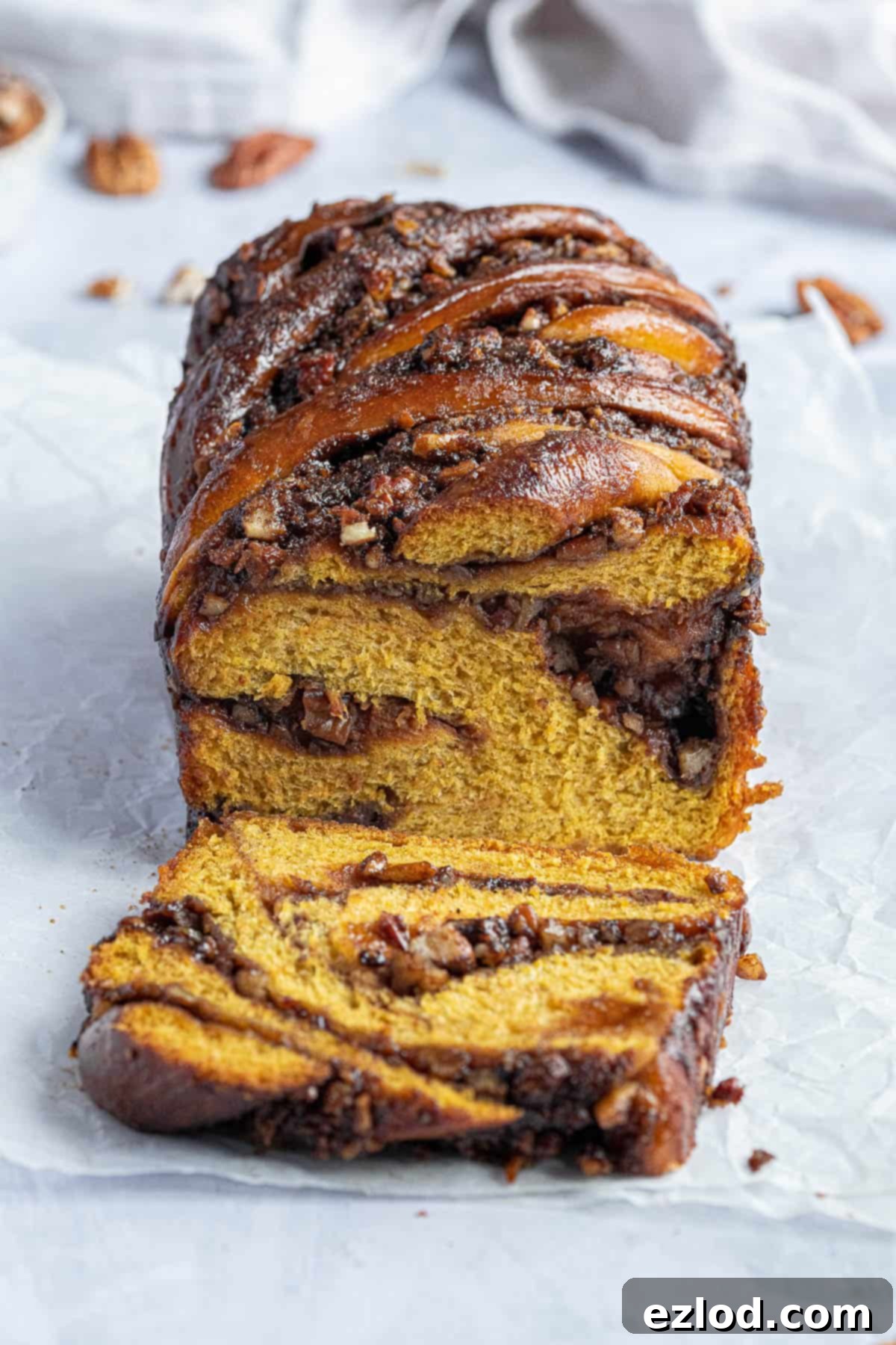 Close up of the sliced pumpkin pecan babka.