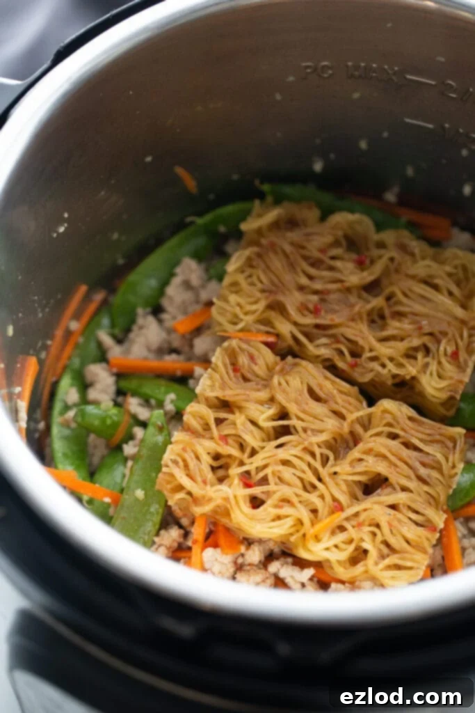 Instant Pot of Ramen Noodle stir fry, ready to cook.