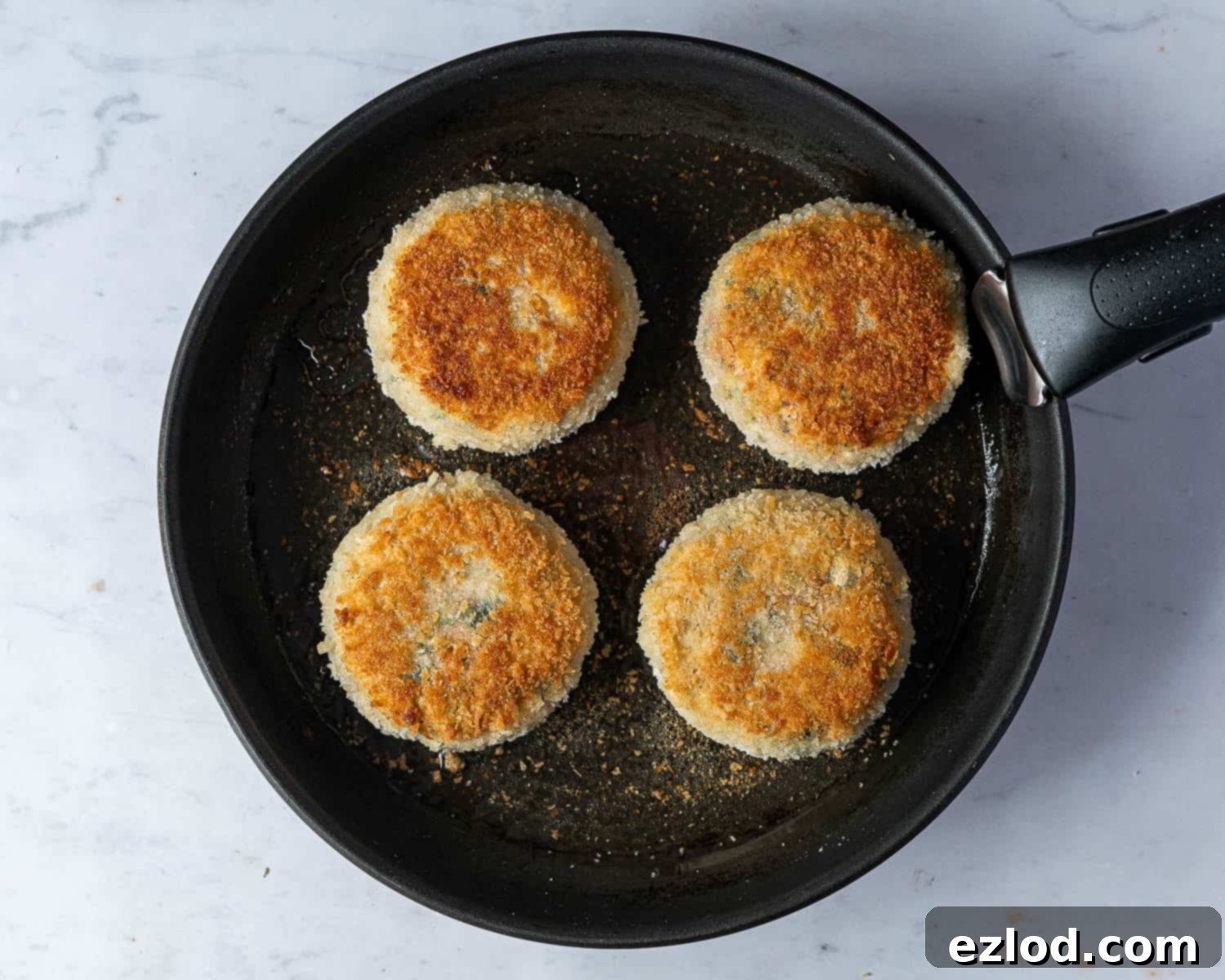 Step 10: Frying the vegan fish cakes in a pan.