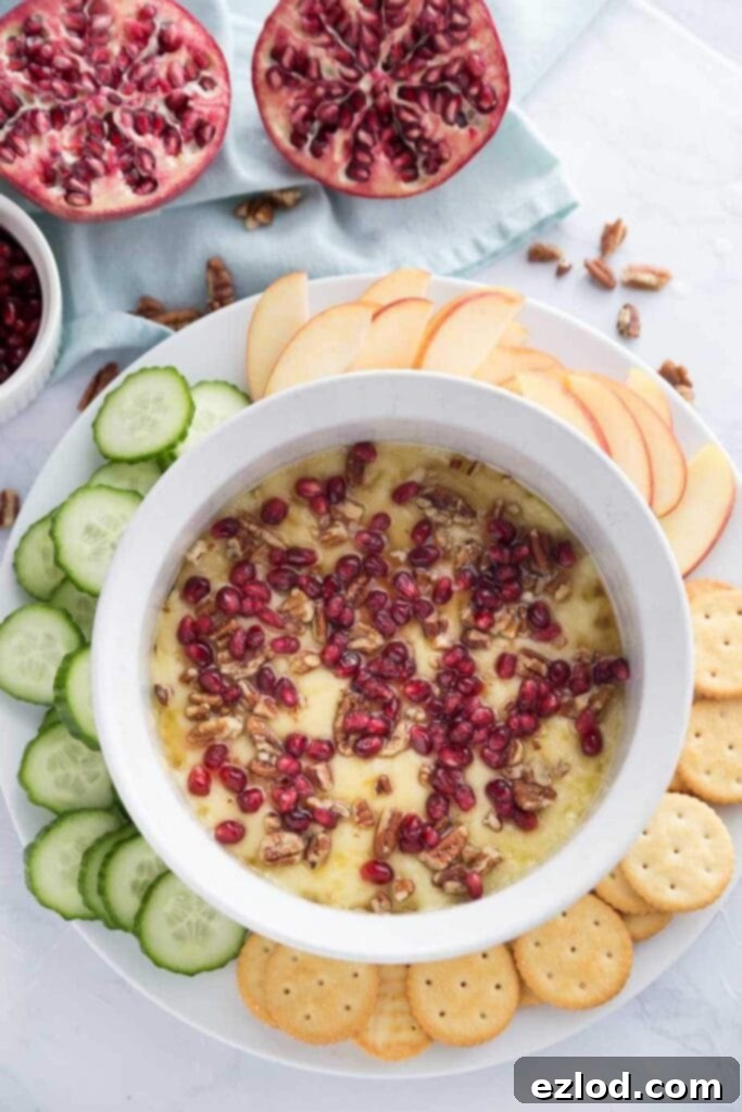 A baked brie wheel, golden and gooey, emerging from the Instant Pot, perfectly ready to be served as a sophisticated brunch appetizer.