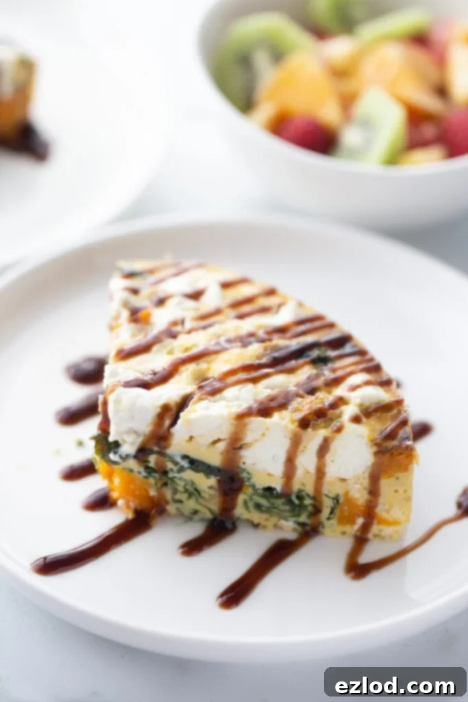 A perfectly baked Instant Pot Butternut Squash Frittata with Goat Cheese, presented beautifully on a plate, ready to be served for brunch.