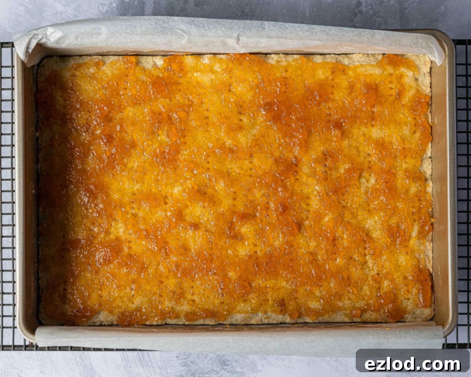 Step 6, the base spread with apricot jam.