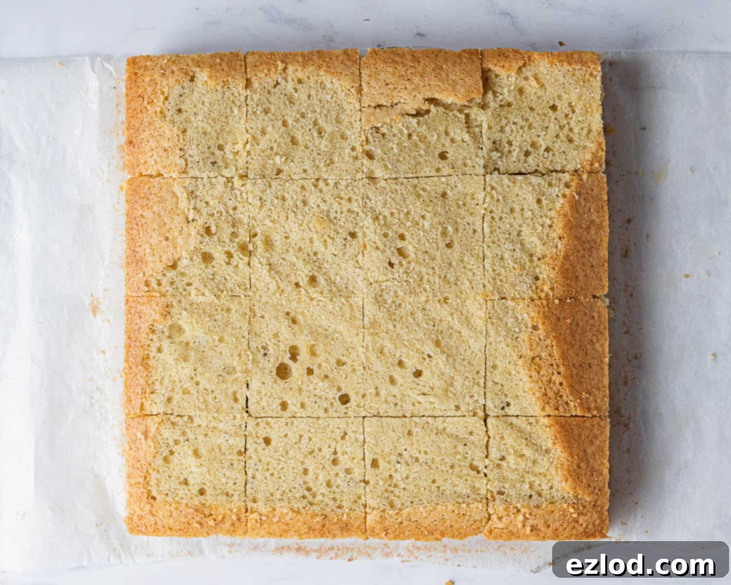 Step 3, the trimmed cake cut into squares.
