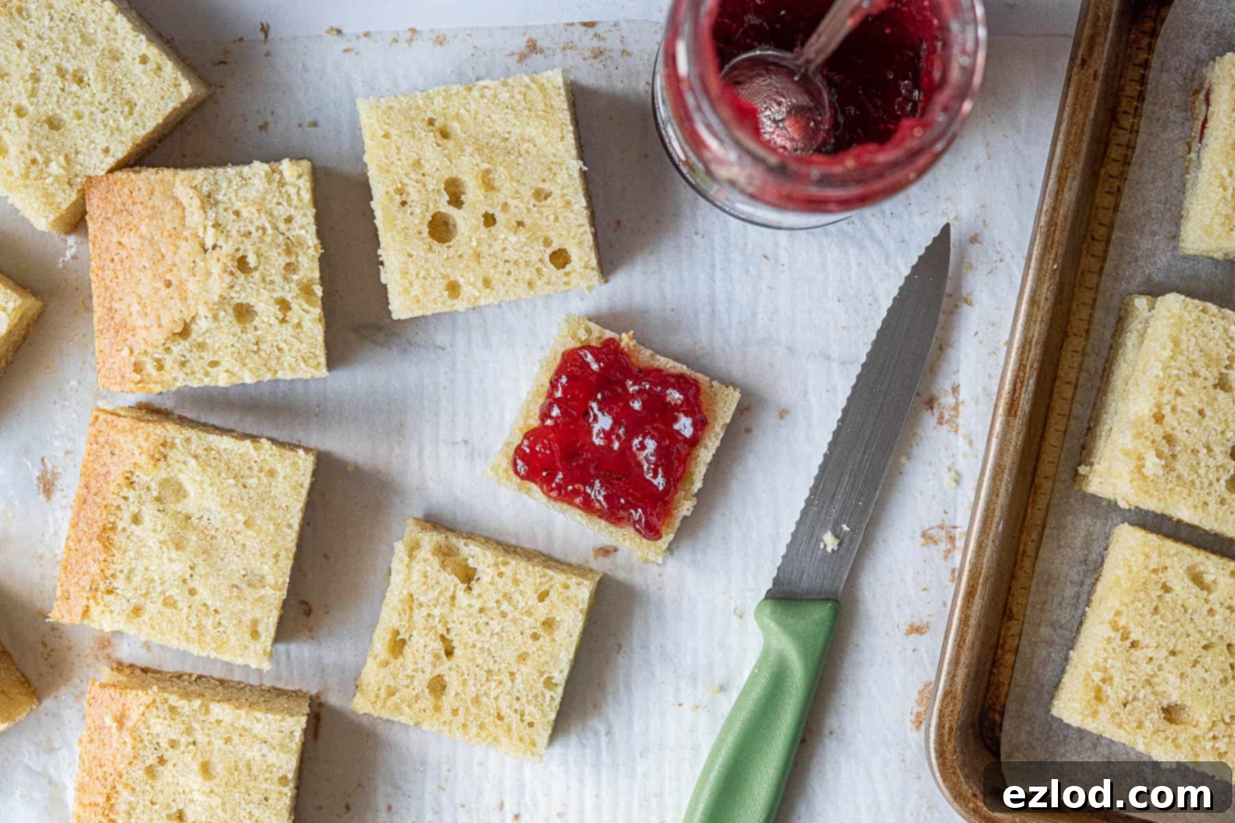 Step 4, slicing the squares in half and sandwiching with jam.