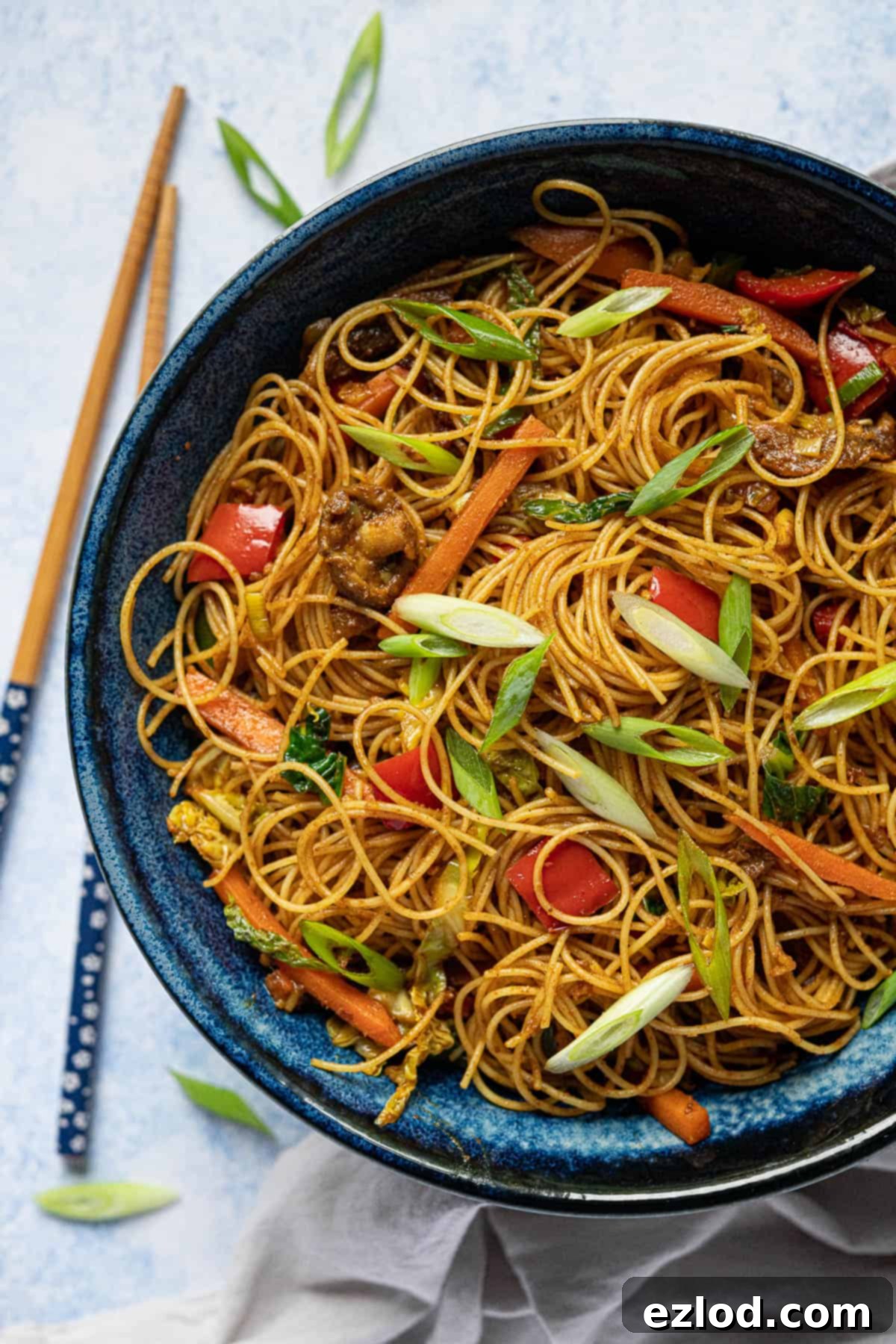 Close up of a bowl of curry noodles.