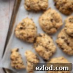 Vegan rock cakes on a tray, one split in half.