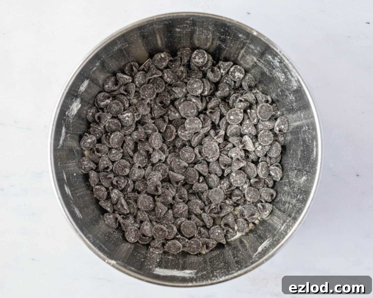 Step 3: Chocolate chips coated in flour in a small bowl.