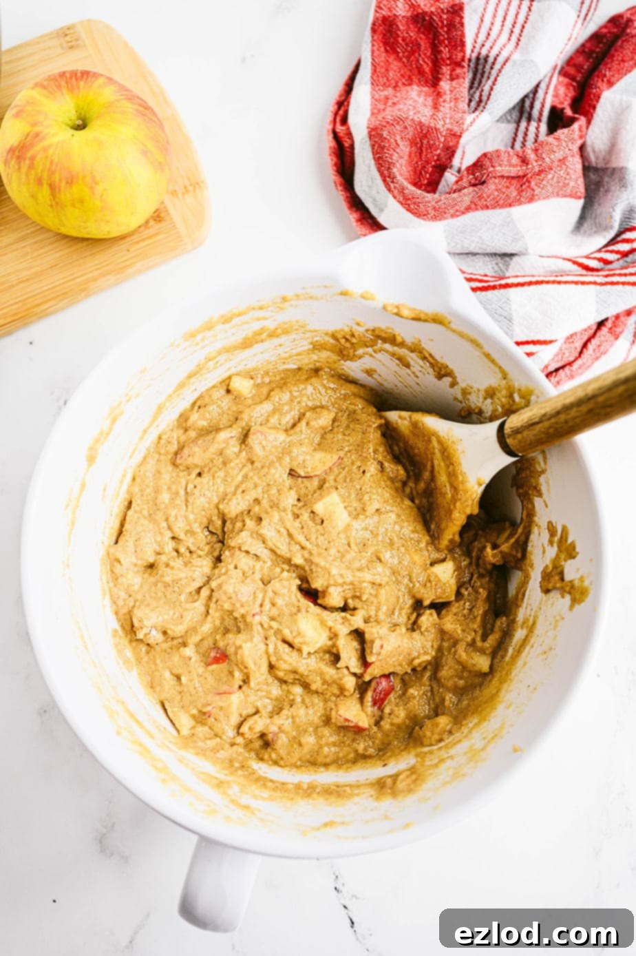 Overhead image of healthy apple muffin batter, ready to fill muffin tins