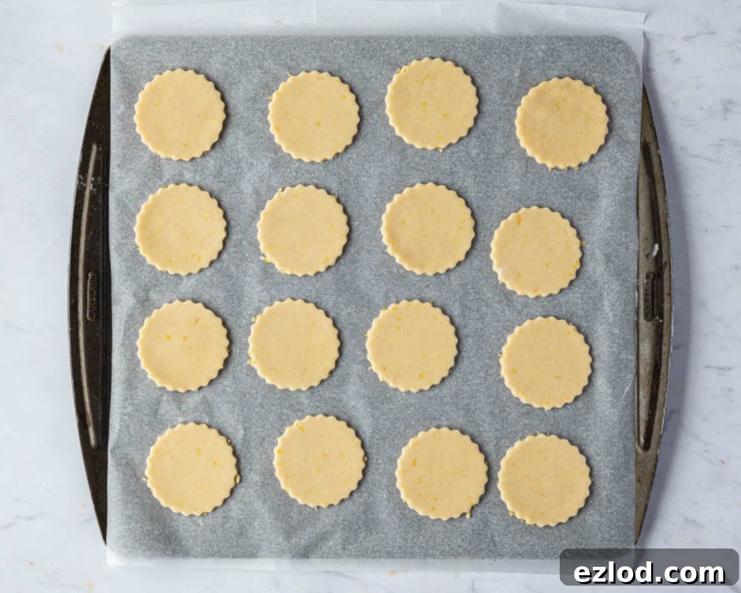 Step 5, the cut out cookies on a baking sheet.
