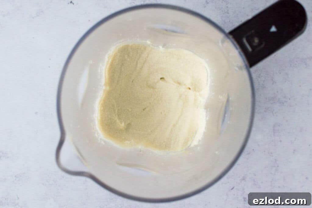 The smoothly blended vegan almond ricotta cheese, showing its creamy texture, ready for the galette.