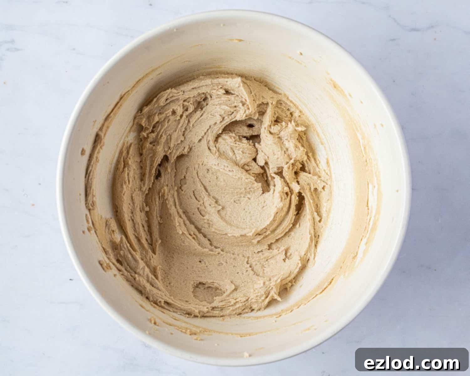 Step 1: Creamed vegan butter, sugars, and vanilla extract in a mixing bowl, light and fluffy.
