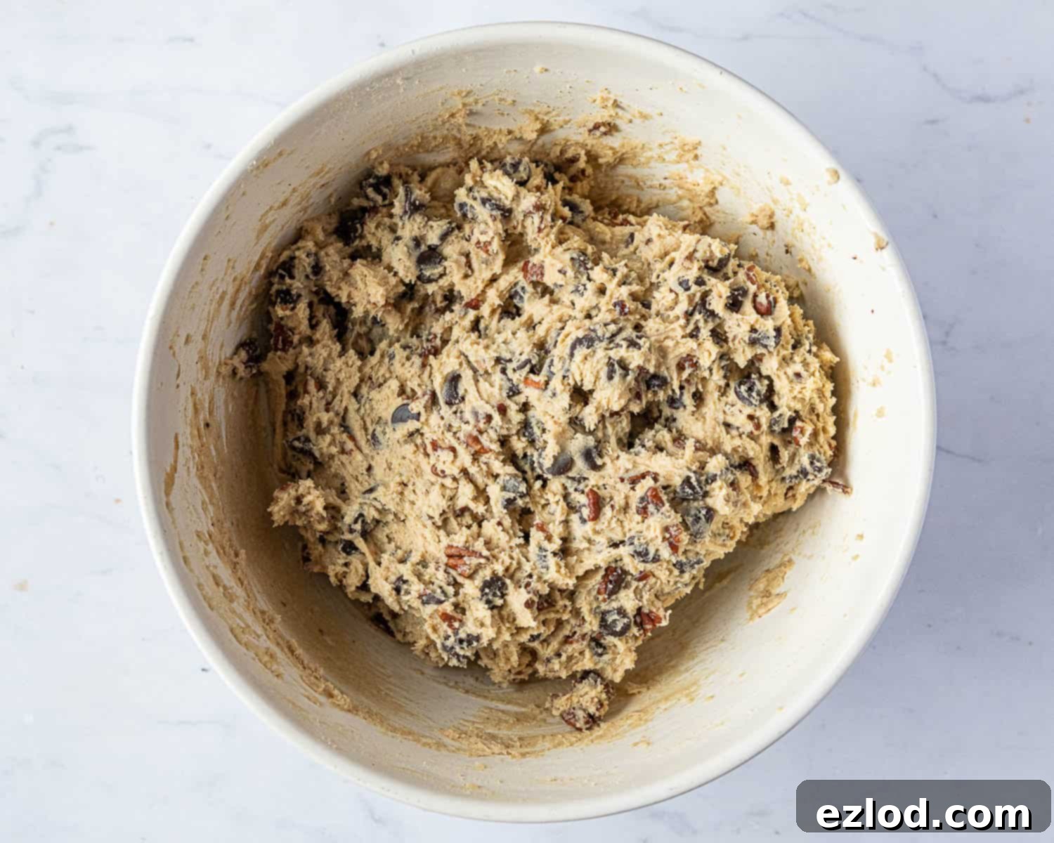 Step 3: The finished cookie dough, ready for chilling, packed with chocolate chips and chopped pecans.