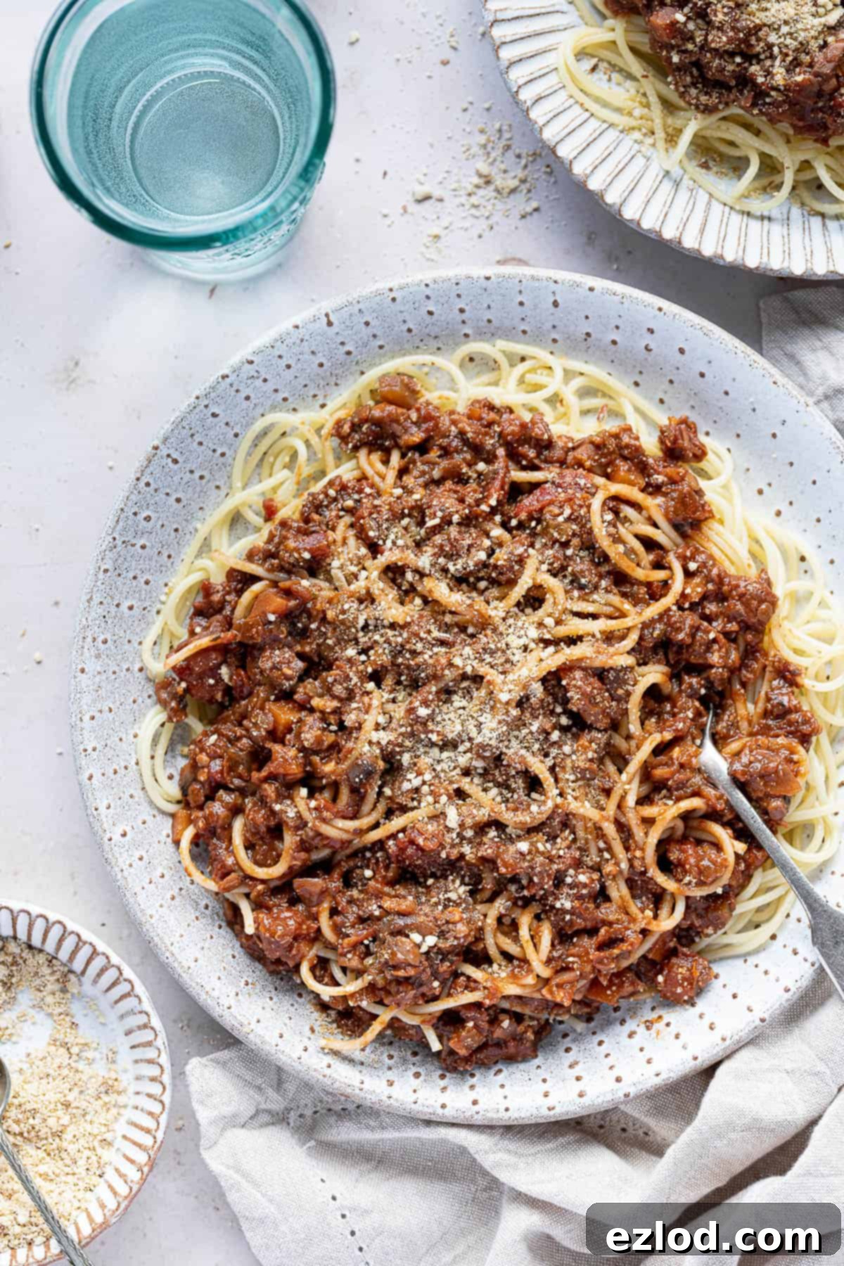 A plate of vegan lentil walnut spaghetti bolognese.