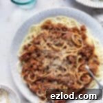 A plate of vegan lentil walnut spaghetti bolognese.