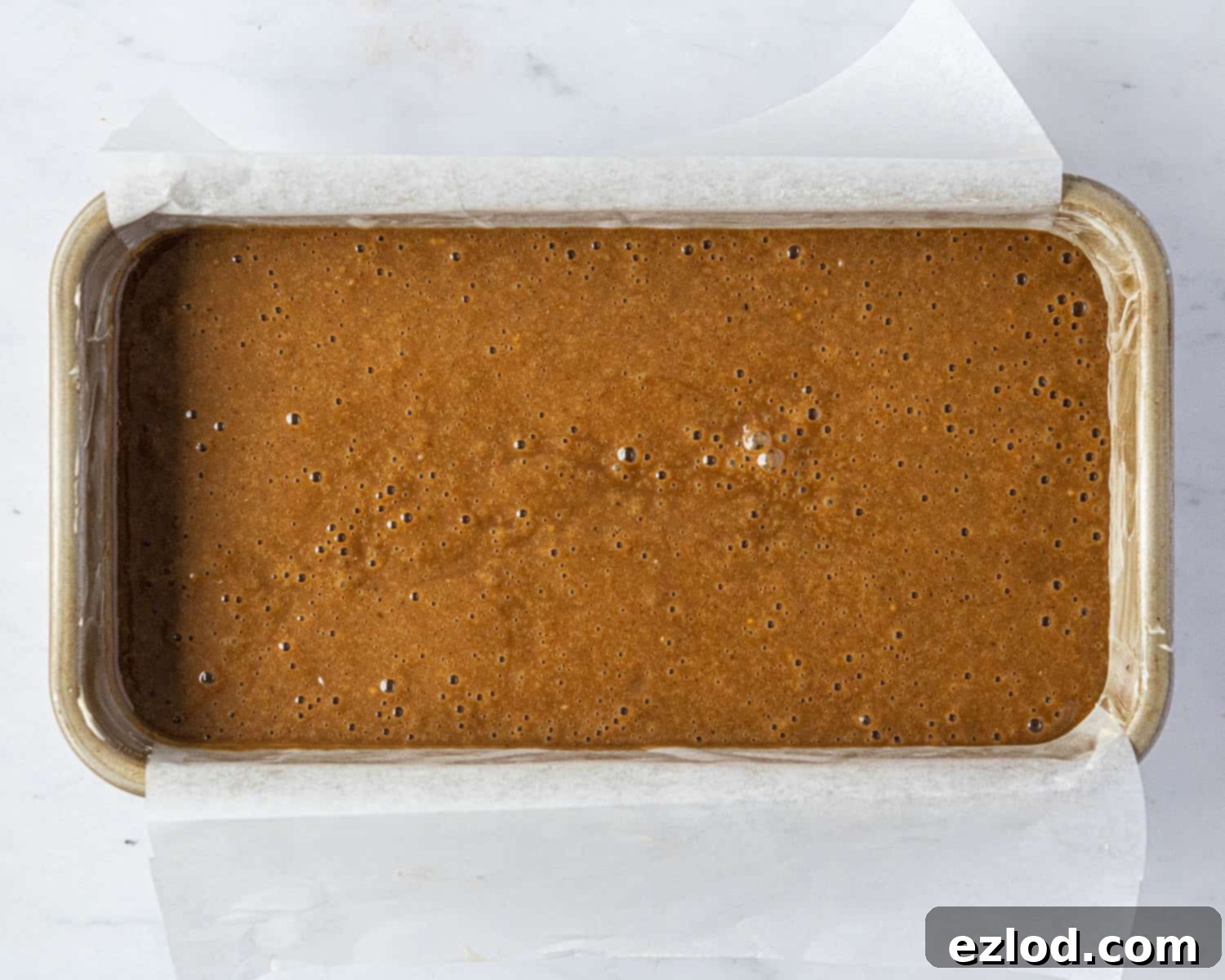 Step 6, the batter in a loaf pan before baking.