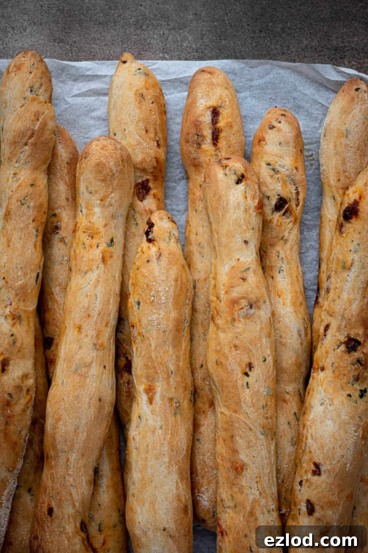Artisan Sun Dried Tomato Breadsticks 8 Close up of sun dried tomato breadsticks.