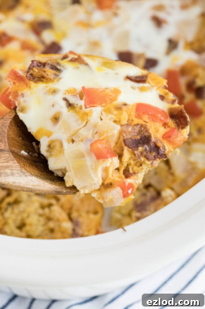 A close up shot of a fluffy, browned low carb breakfast casserole in a slow cooker