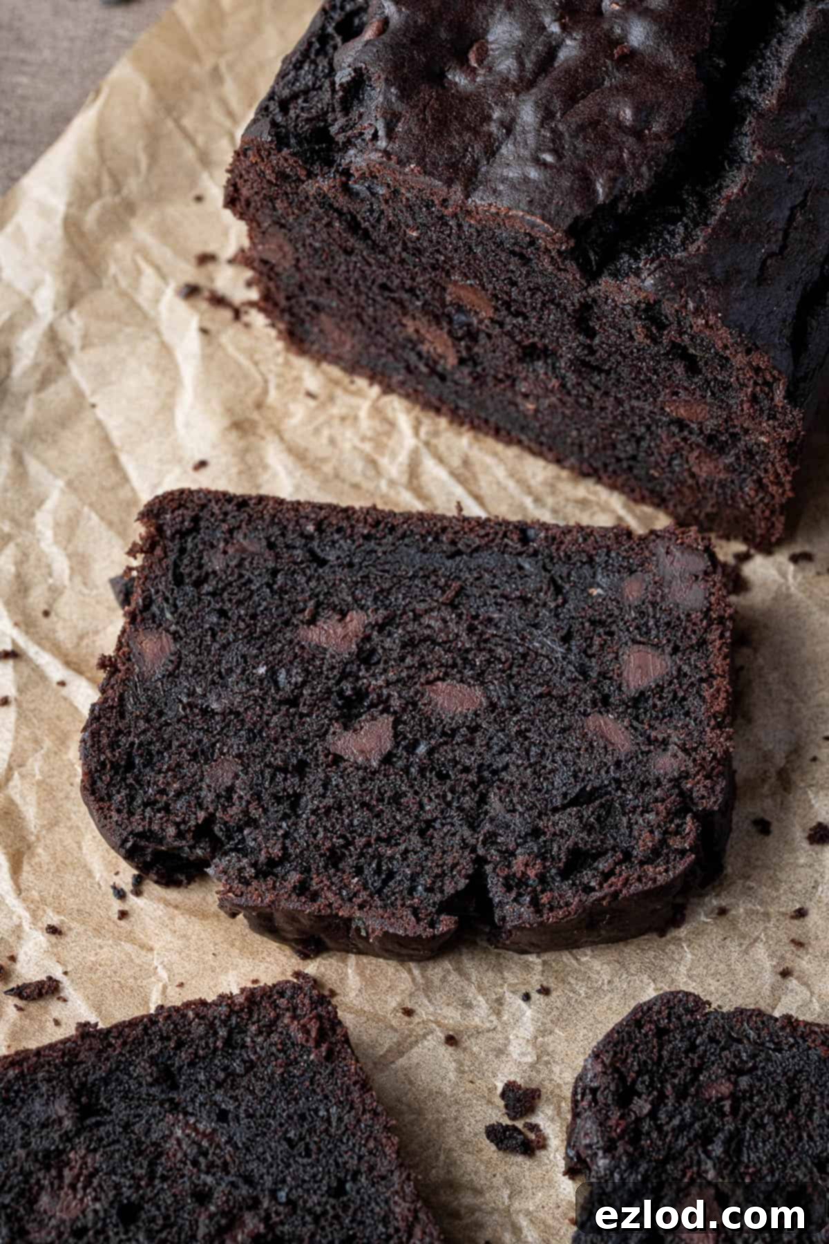 Close up of a slice of vegan chocolate courgette cake.