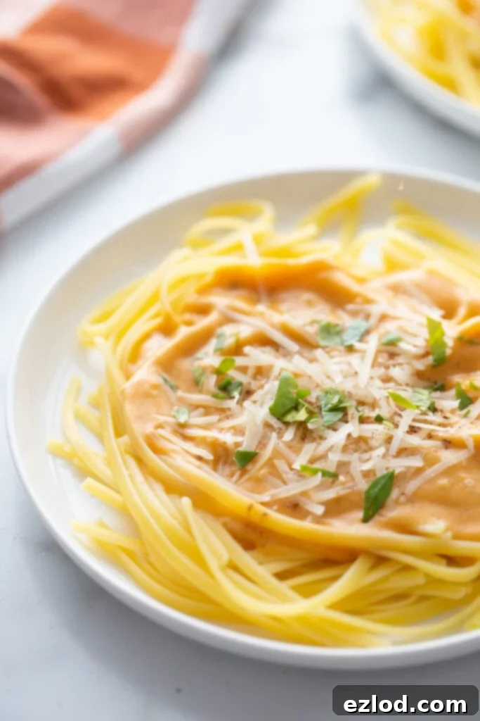 Finished pumpkin alfredo sauce in a pan, ready to be served.