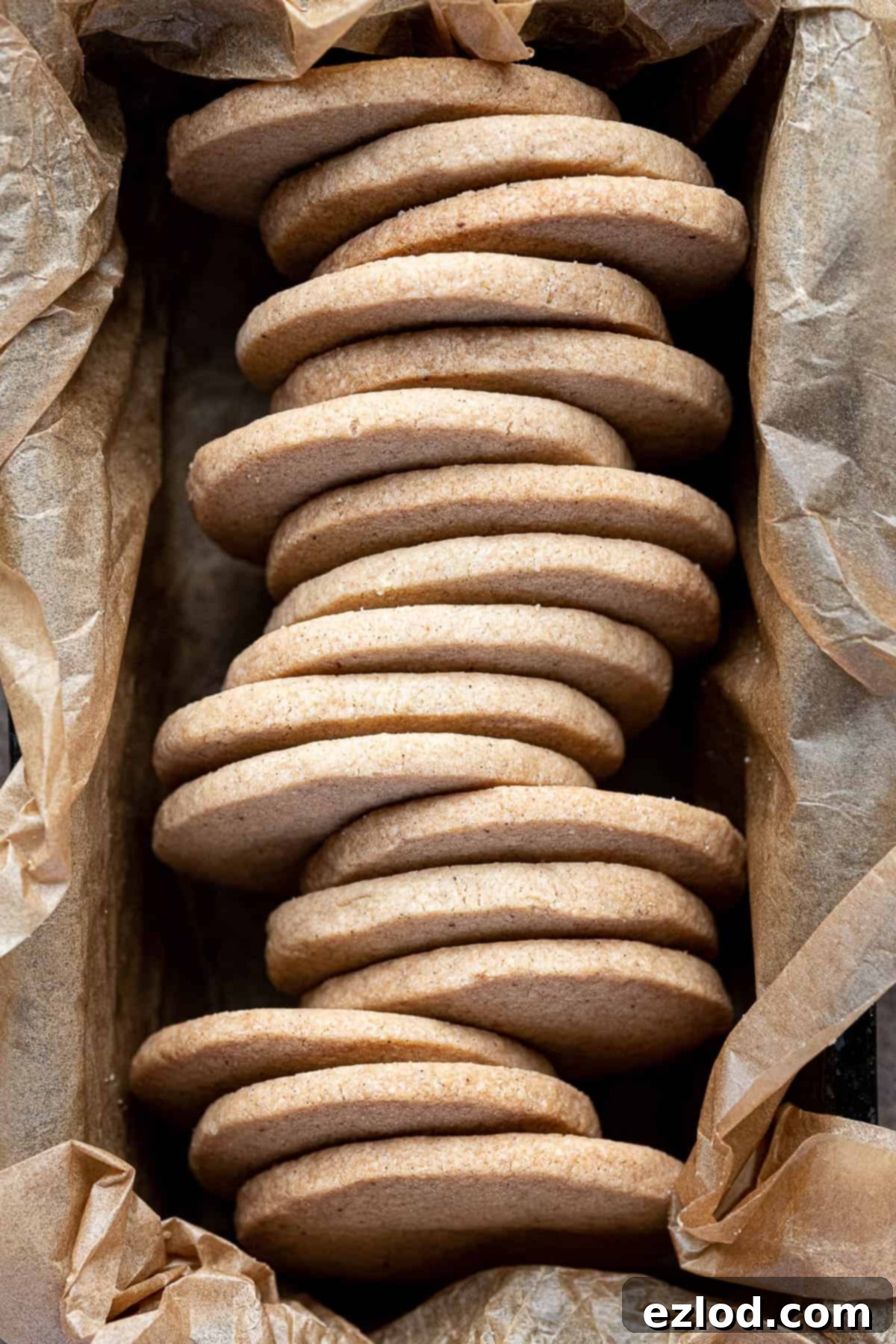 Autumn Plant Based Pumpkin Spice Shortbread 12 Close up of beautifully arranged pumpkin spice shortbread cookies in a loaf tin, ready for serving.