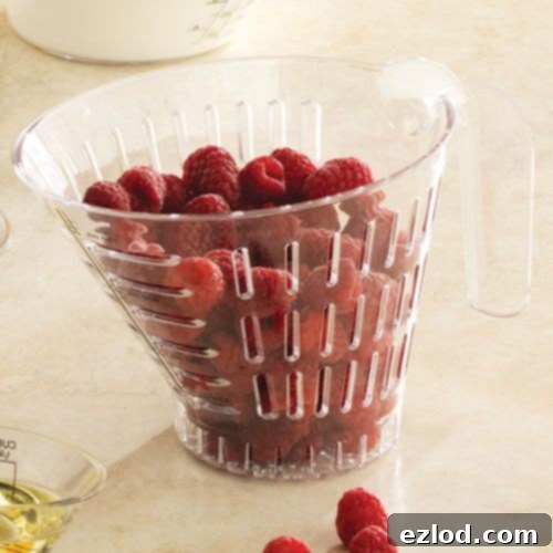 Pampered Chef Easy Read Measuring Colander with ingredients