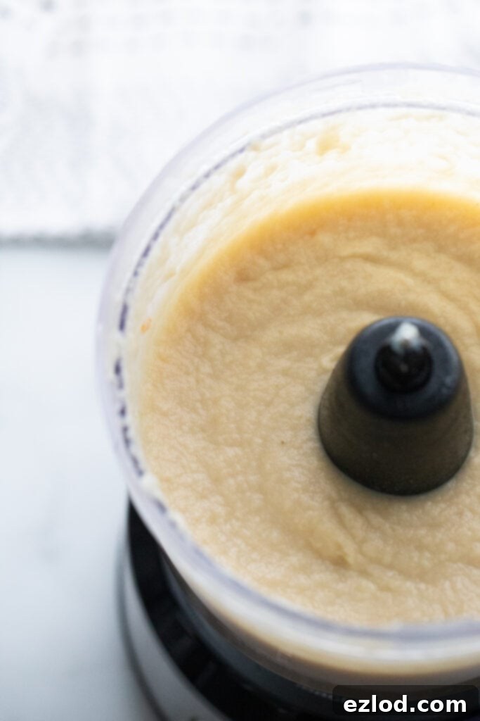 Overhead image: Cauliflower puree in a food processor