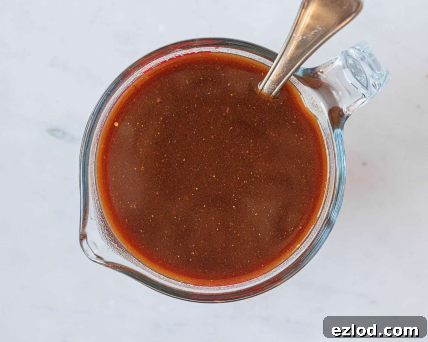 Step 1: Wet ingredients for vegan seitan meatloaf, combined in a large jug.