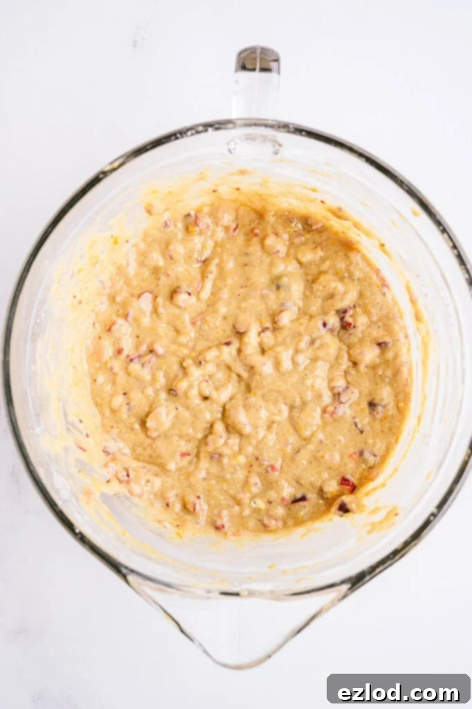 Wet ingredients for gluten free orange and cranberry muffins