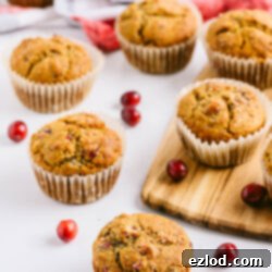 Freshly baked gluten-free and dairy-free cranberry orange muffins, ready to be enjoyed.