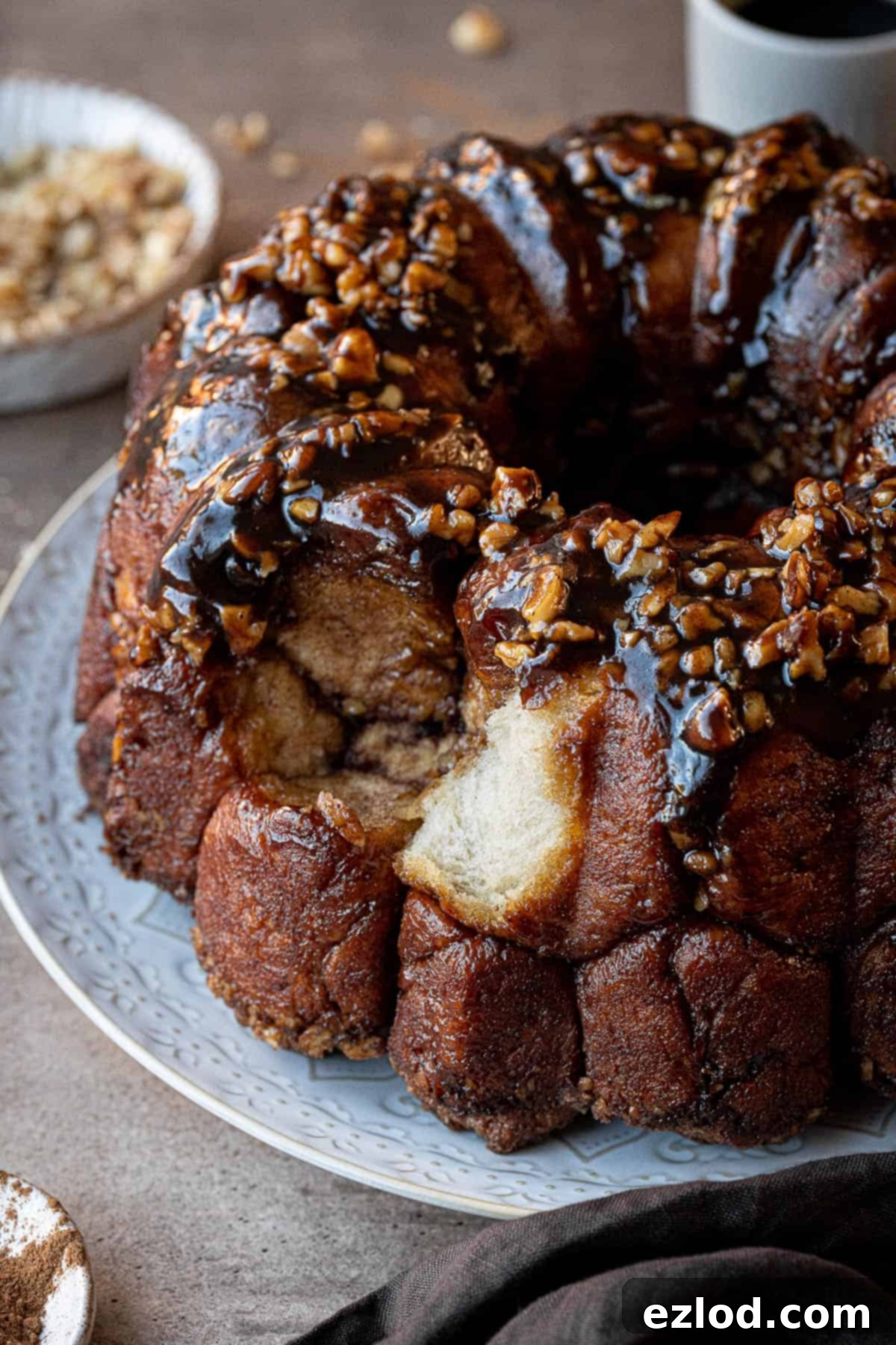 Close up of the monkey bread with a couple of pieces removed, showing its pull-apart nature.