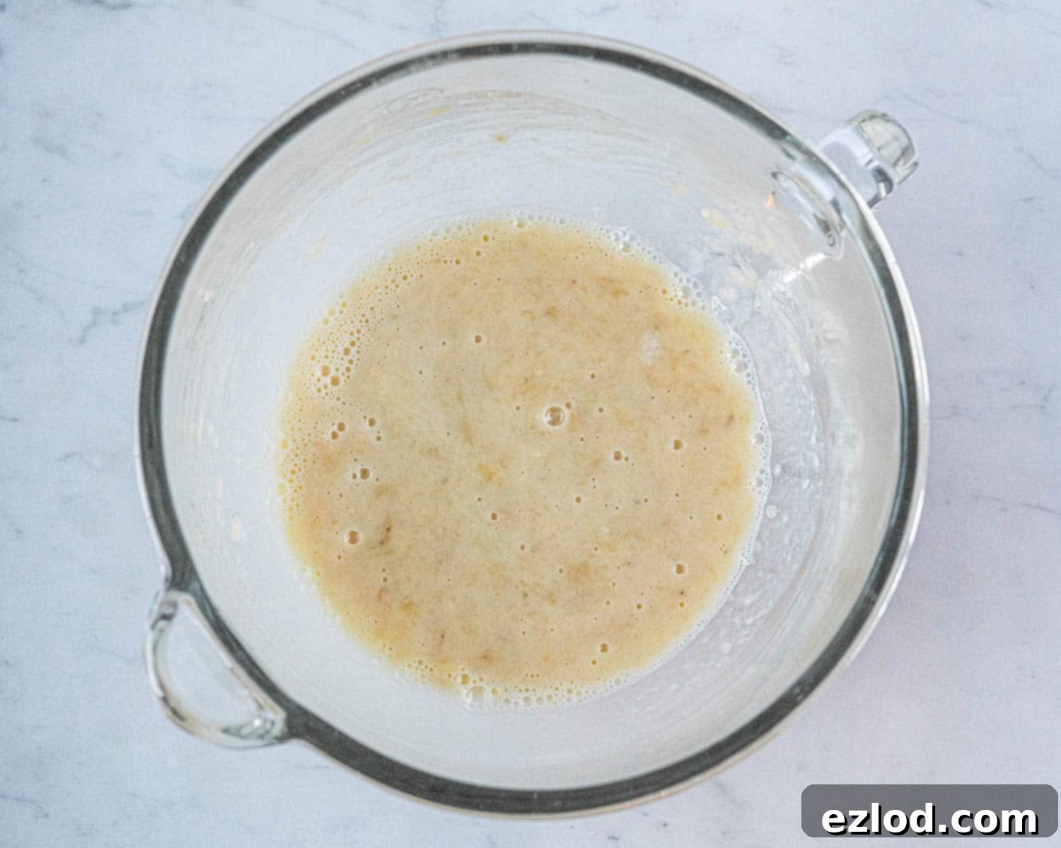Step 1, the wet ingredients mixed together in a stand mixer bowl.