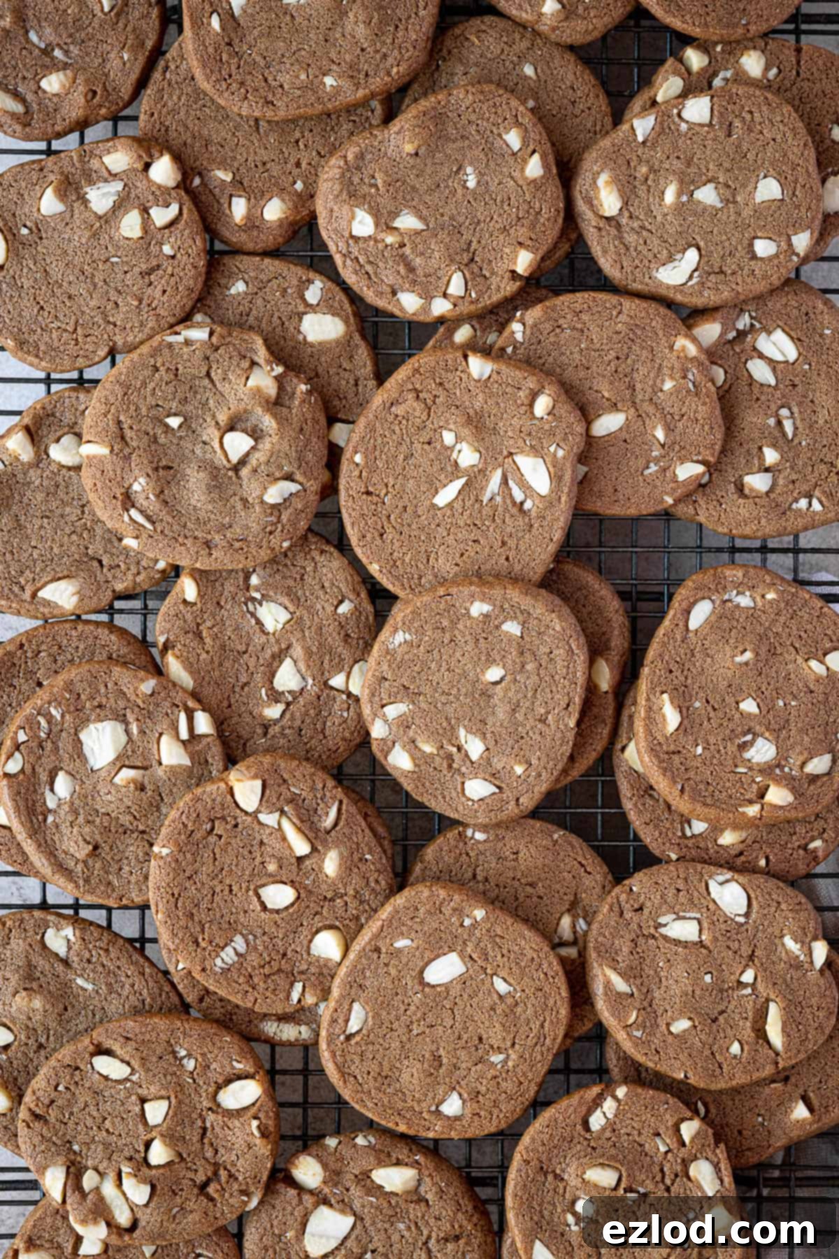 Close-up shot of a tray of freshly baked vegan brunkager, showcasing their golden-brown edges and inviting crisp texture.