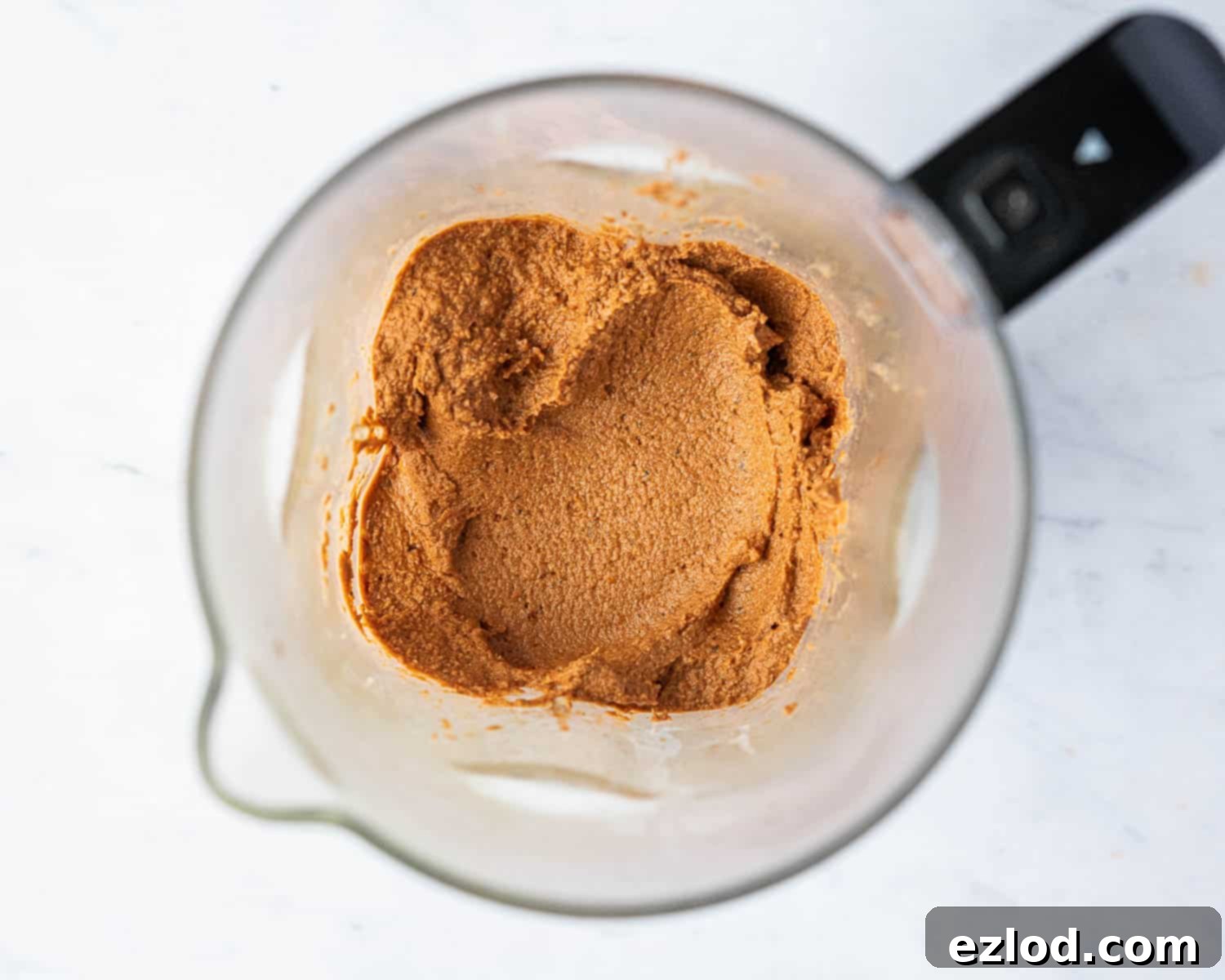 Vegan Tomato Sunflower Spread 6 Step 3: The beautifully blended, smooth, and creamy tomato sunflower seed pâté inside the blender, showing its perfect consistency.