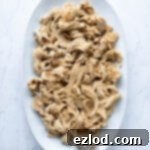 Shredded seitan chicken on a plate.
