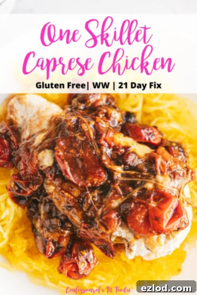 Close up photo of chicken topped with tomatoes, balsamic, and melted mozzarella cheese over spaghetti squash, with a black and pink text overlay- One Skillet Caprese Chicken | Gluten Free | WW | 21 Day Fix | Confessions of a Fit Foodie